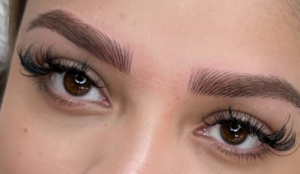 Close-up of perfectly shaped and styled eyebrows.