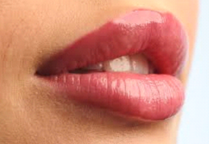 Close-up of lips after lip blushing treatment.
