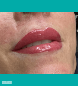 Fresh semi-permanent lip color treatment with glossy pink finish